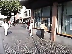 Girl walks the public streets totally naked