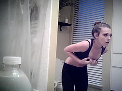 Beautiful teen puts her slim body on display on hidden cam