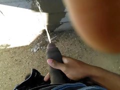 Public pissing on a sunny day