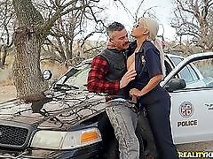 Slutty lady cop bent over her car and fucked from behind